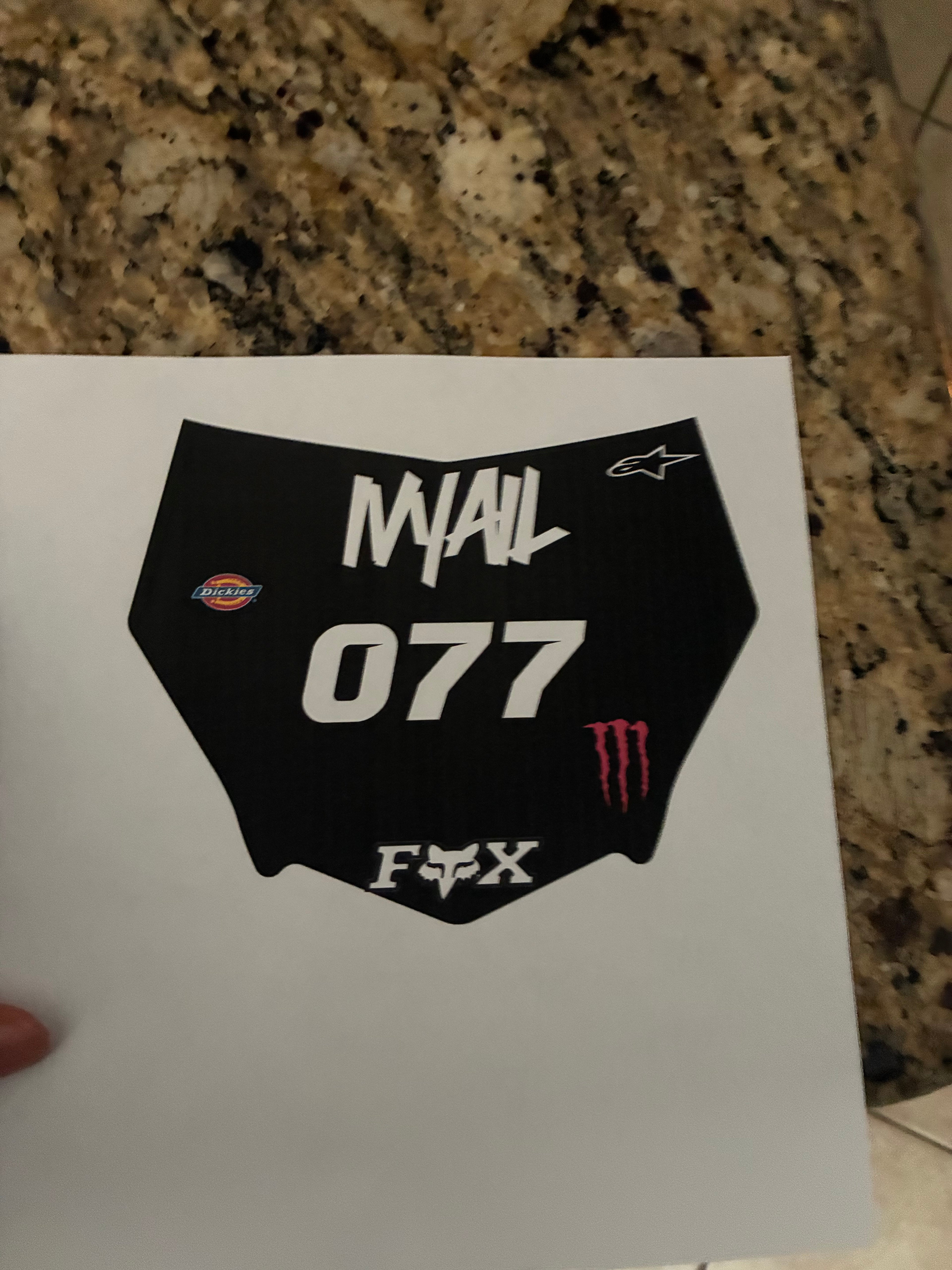 Number plate with custom sticker